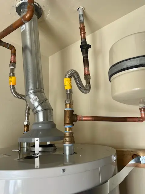 Water heater installation and plumbing repair in Turner Village